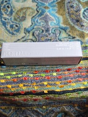 r.e.m. beauty On Your Collar Plumping Lipgloss Shade Roll-Up